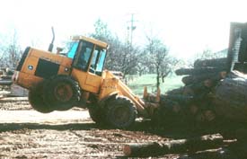 Unsafe operation of loader in log yard Unsafe operation of loader in log yard